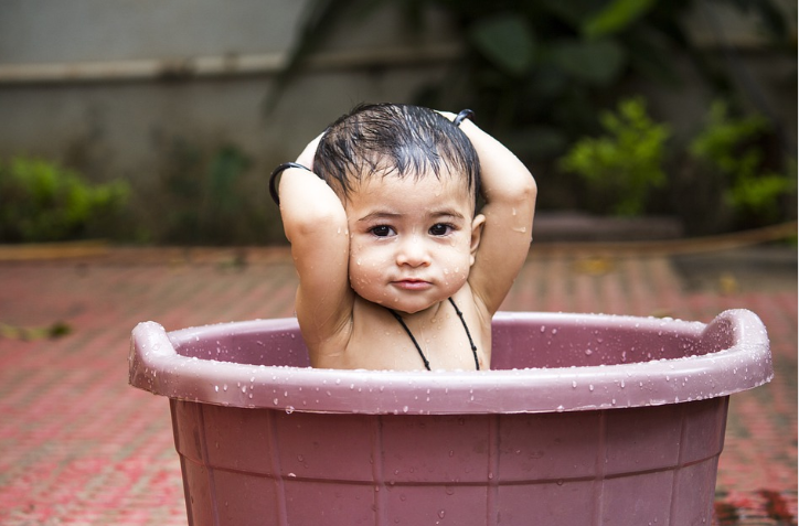 a kid bathing